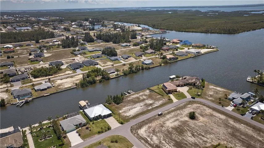 Bird's eye view with a residential view and a water view
