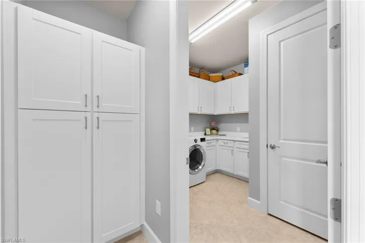 Extra storage just outside of laundry room