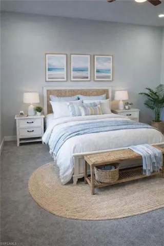 Bedroom with carpet flooring and ceiling fan