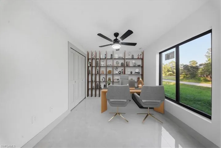 Unfurnished bedroom with a closet and ceiling fan