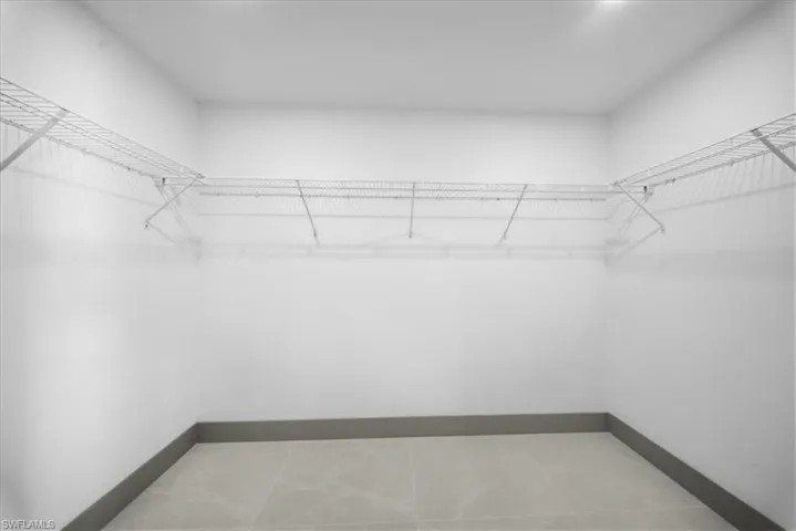 Bedroom with a closet and ceiling fan