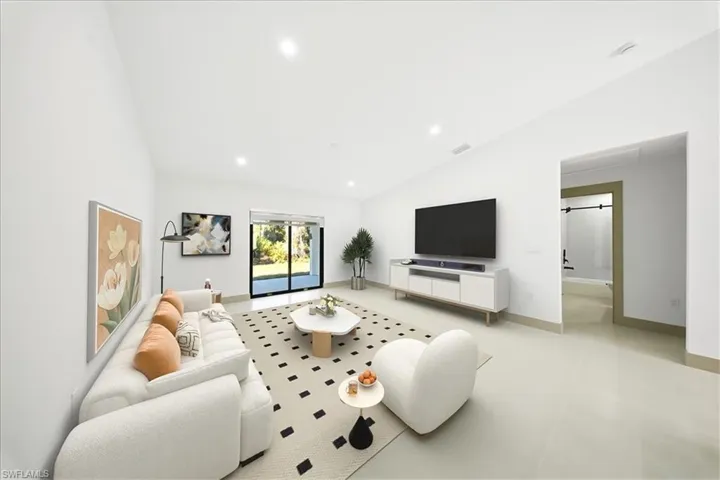 Unfurnished room with baseboards and a ceiling fan