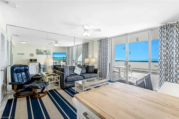 Living area featuring ceiling fan