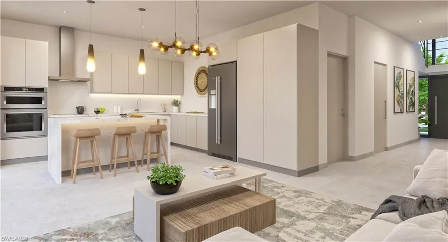 Living area featuring baseboards