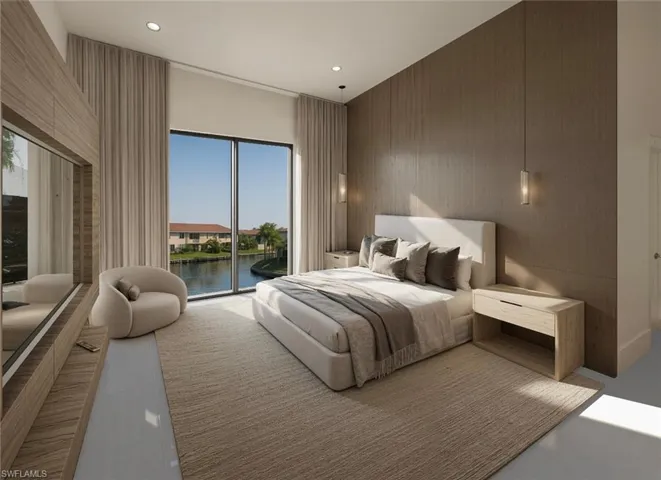 Bedroom with a water view, access to exterior, recessed lighting, and wood walls