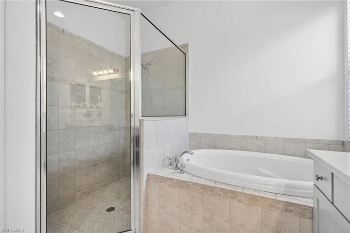 Primary Bathroom Hers - Shower and Tub