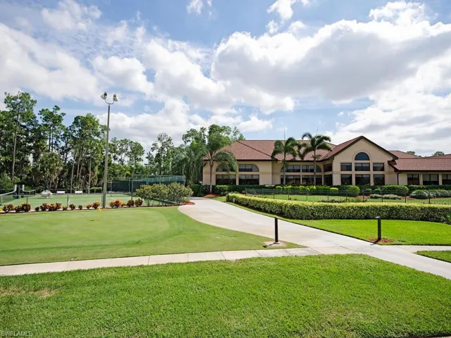 View of property's community featuring a yard