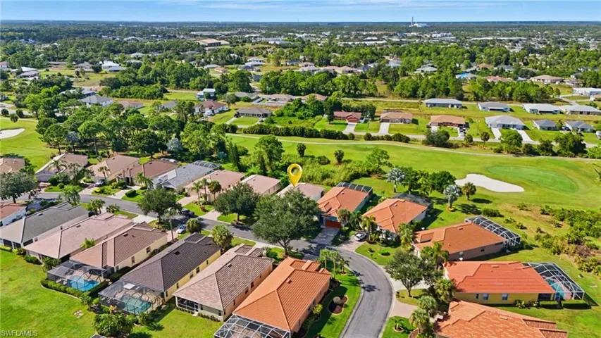 Aerial view of residential area with a local golf course - Virtually Edited Image