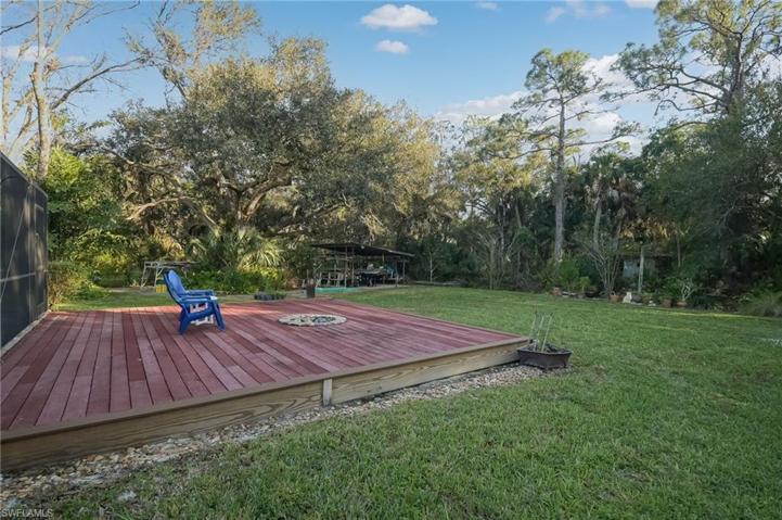 Huge custom deck with built in fire pit just perfect for enoying the cooler winter weather.