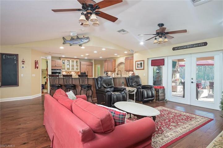 Family room facing kitchen and outdoor entertainment area.