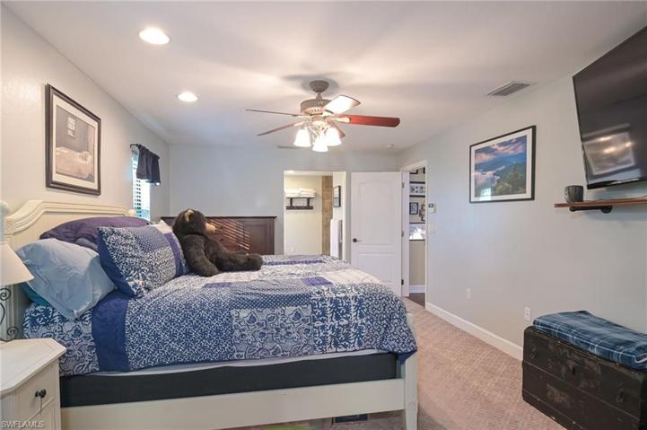 Bedroom view facing master bathroom suite.