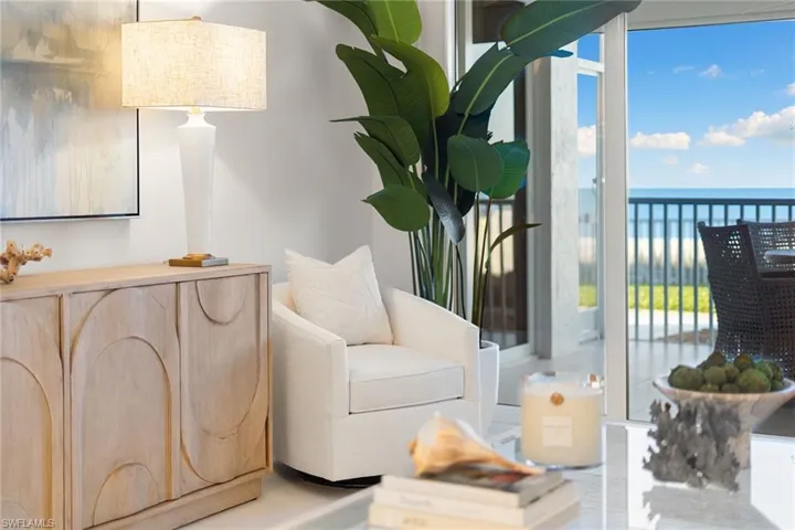 Living area featuring a water view