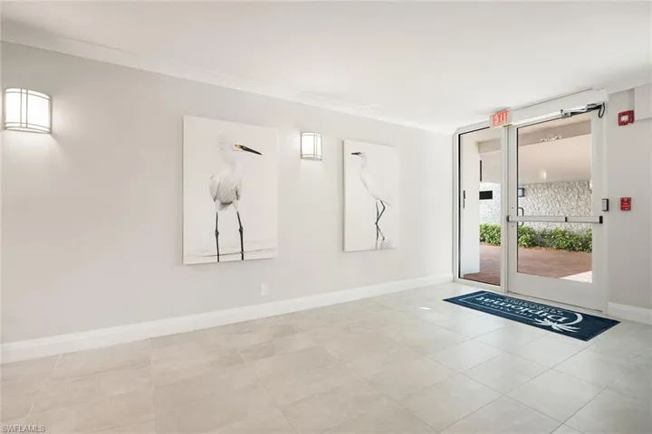 Lobby featuring crown molding