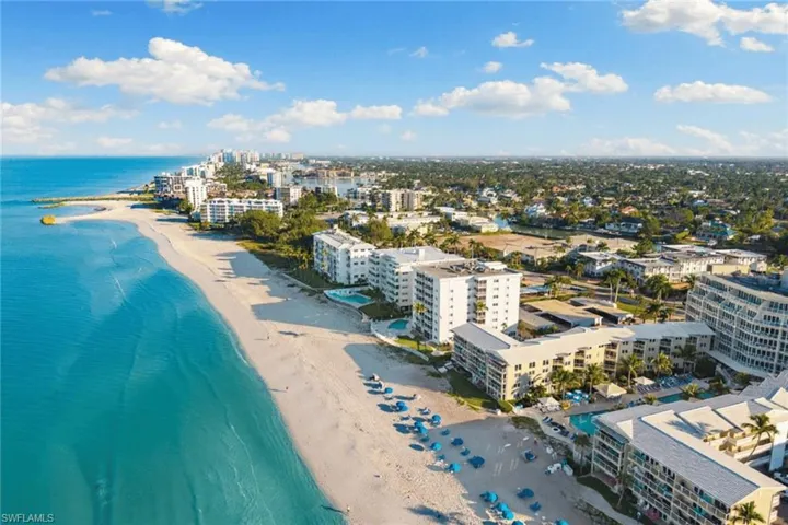 View of urban area with waterfront with a beach