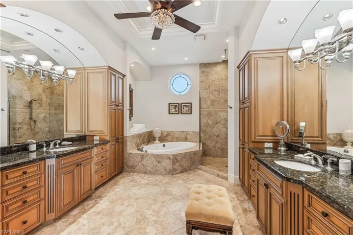 Huge Primary bathroom with a jacuzzi tub and a separate walk-in shower