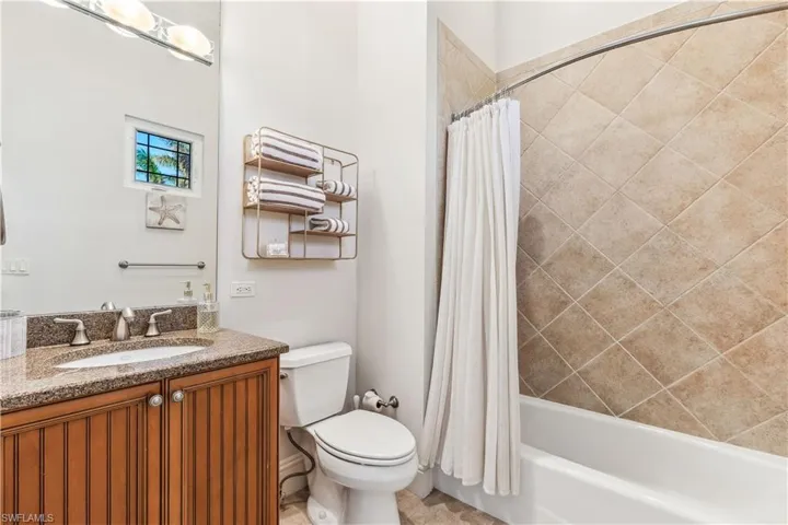 Guest bathroom with tub