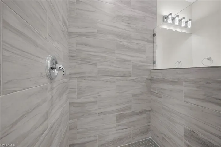 Bathroom with tiled shower