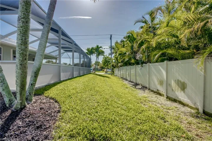 View of yard featuring a lanai
