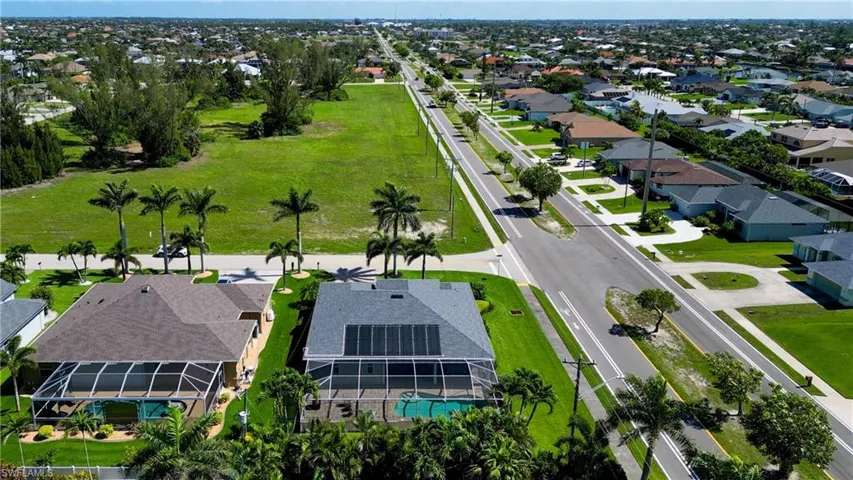 Aerial view of residential area with a pool area