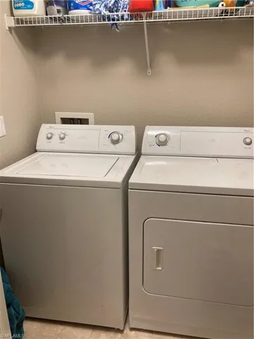 Laundry room with washer and dryer