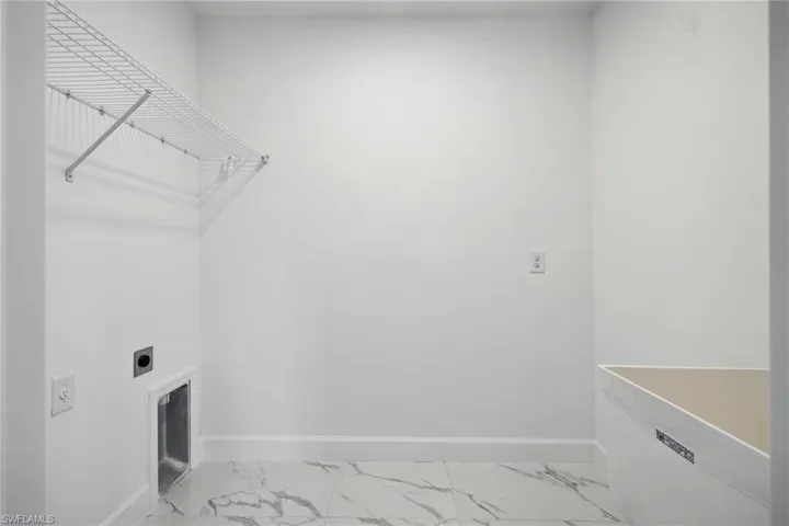 Laundry area with electric dryer hookup
