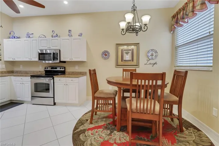 Dinning area with a table that expands to seat 6 people.