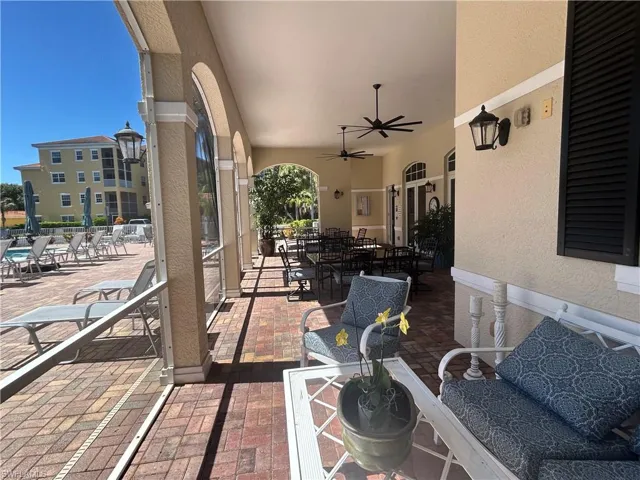 View of patio / terrace with outdoor dining area and a ceiling fan
