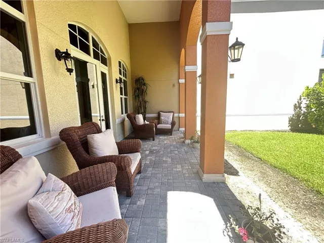 View of patio featuring an outdoor hangout area