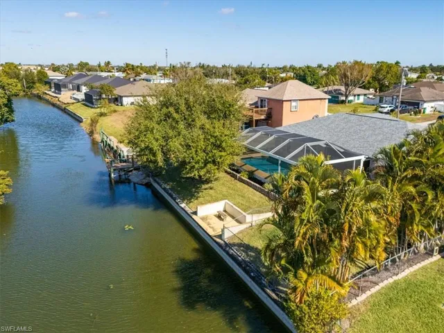 Aerial view of residential area with a large body of water