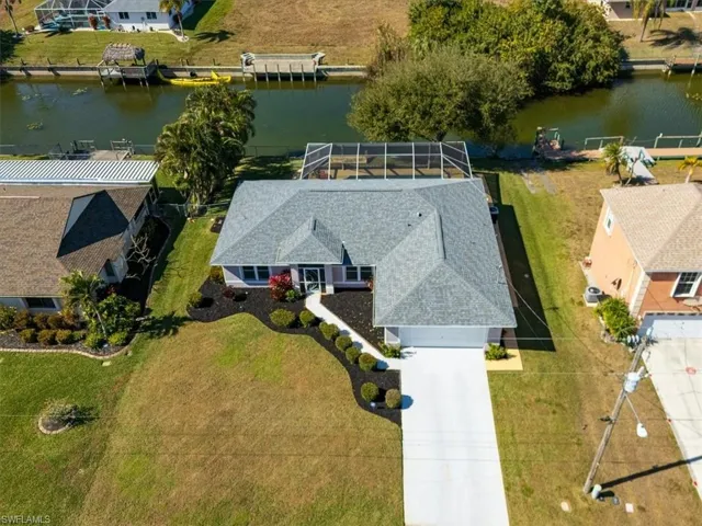 View of subject property with a large body of water