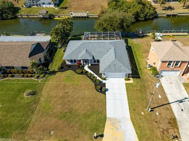 View of subject property with a large body of water