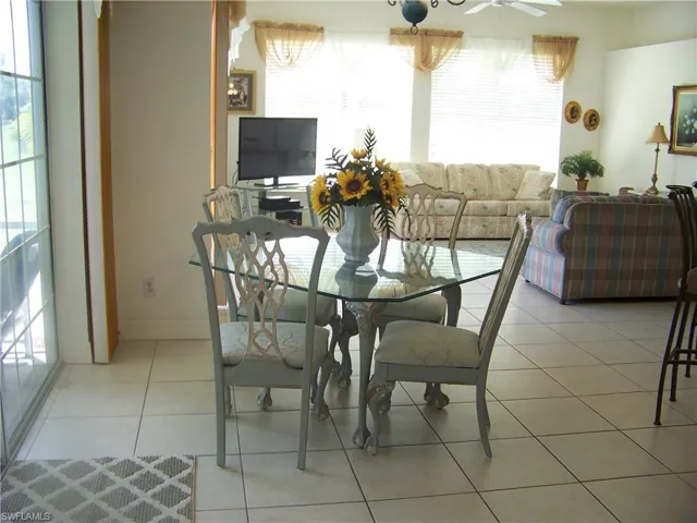Dinette/family room with sliders to lanai.