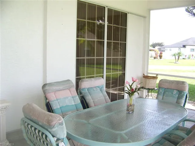Lanai with pocket sliders that go to master bedroom.