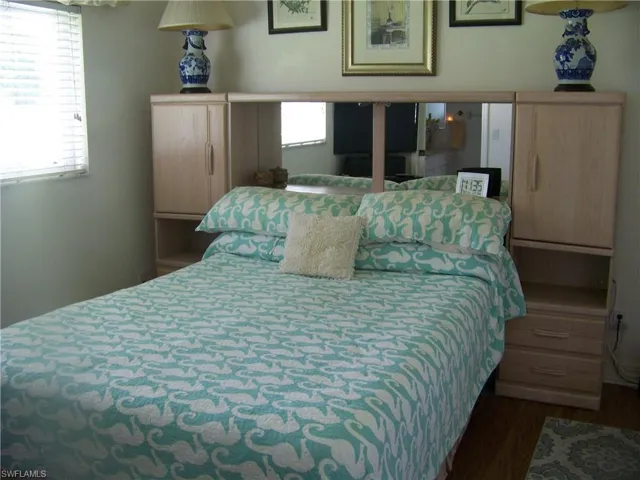 Guest bedroom #2 also with wood-like flooring
