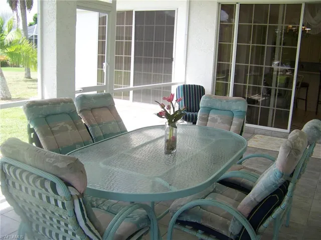 Lanai with 2 more sets of sliders to dinette/kitchen area and family room!