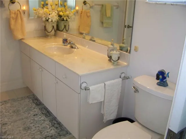 Guest bathroom for Guest bedroom #2. Nice marble vanity/commode.