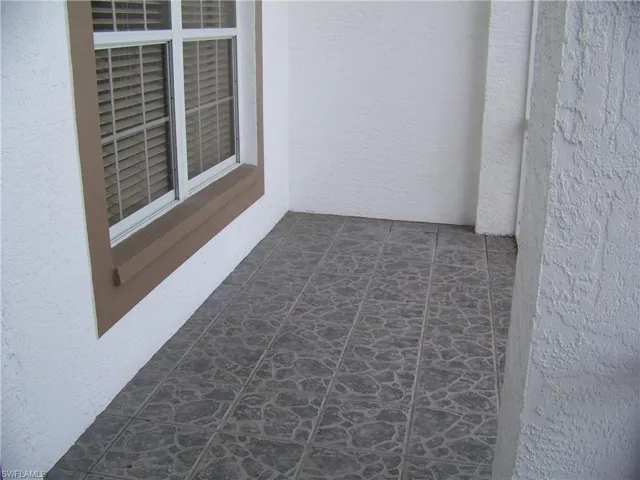 Screened & tiled front sitting area for extra enjoyment