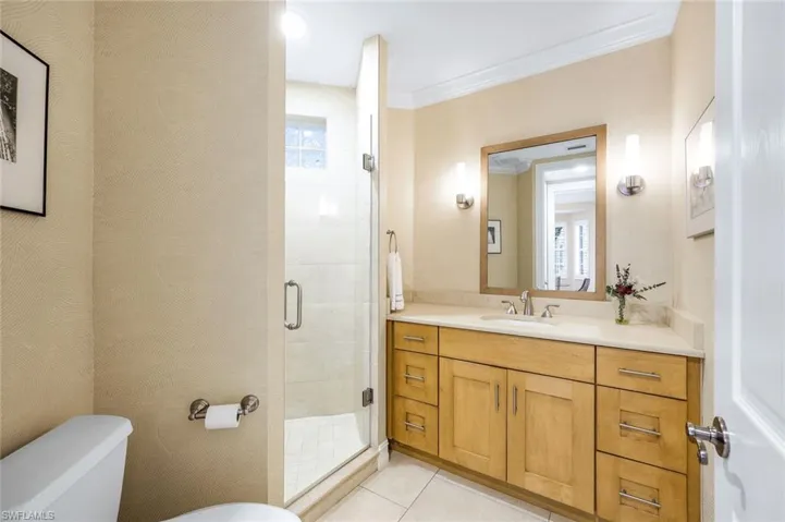 2nd Bathroom with Walk-In Tiled Shower and Vanity with Custom Wood Cabinetry incl. Pull-Outs
