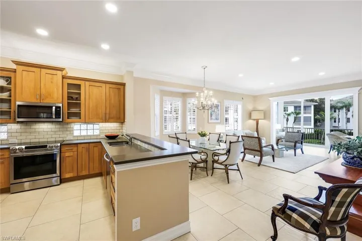 Reimagined Great Room Design Features 10 Ft Ceilings Topped with Crown Molding Throughout