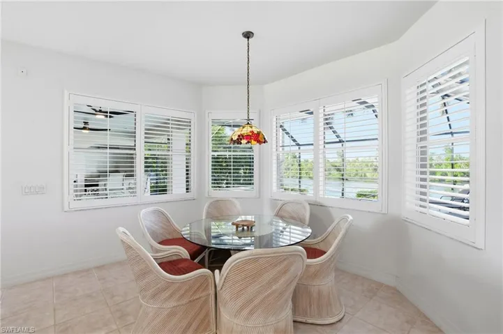 Dining room featuring light tile patterned flooring