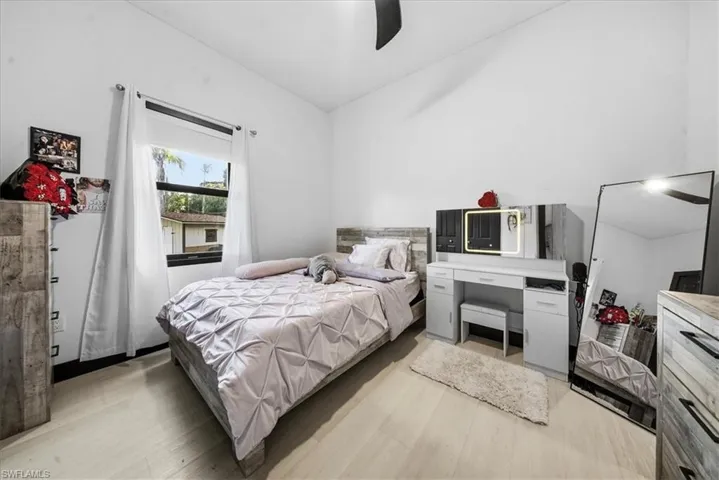 Bedroom featuring a ceiling fan and light wood-style floors