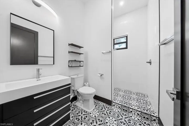 Full bath with vanity and walk in shower