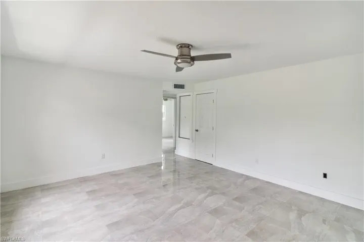 Unfurnished room with ceiling fan