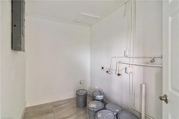 Clothes washing area with electric panel