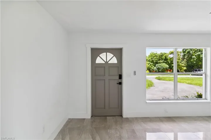 Entrance foyer featuring a wealth of natural light