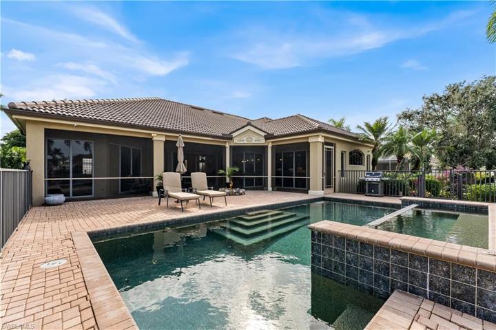 Amazing outdoor space with heated pool and space,screened in lanai space.