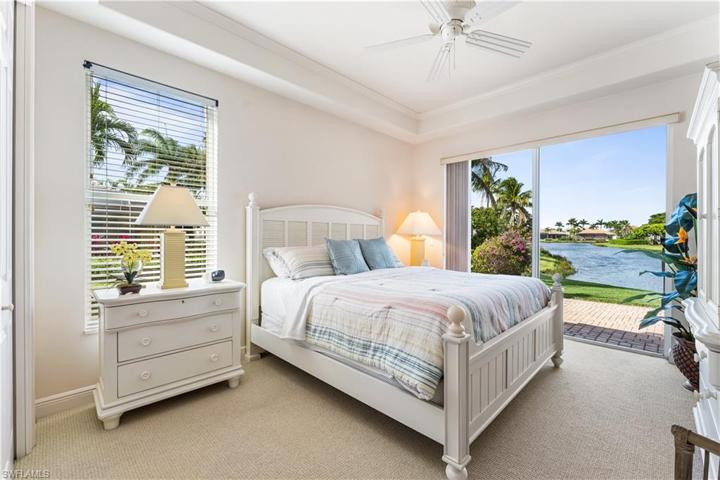 3rd bedroom has access to a pavered deck and to the pool.Tray ceiling.