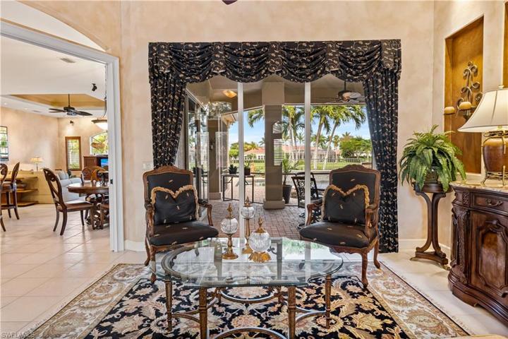 As you enter this masterpiece you have views of the lake and outdoor space! This is 1 of 2 living spaces-there are pocket doors for privacy from the kitchen and the 2nd living space! WOW!