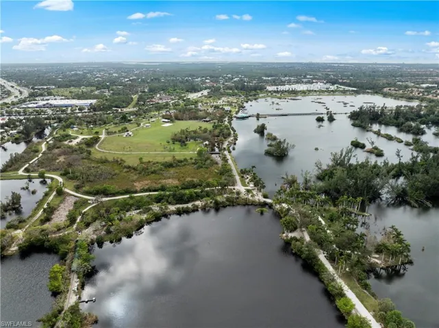 View of property location with a nearby body of water