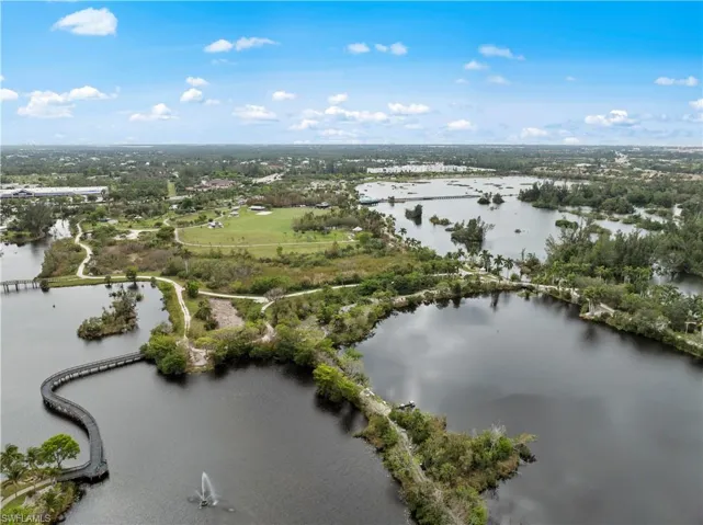 Aerial view of property's location featuring a nearby body of water